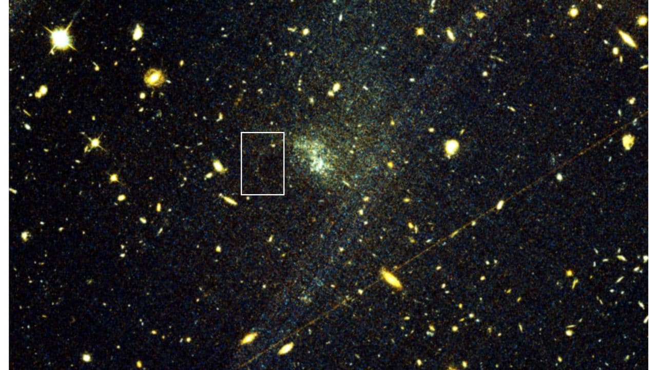 Chance gaze at old Hubble Telescope image leads to discovery that could reveal dark matter's secrets
