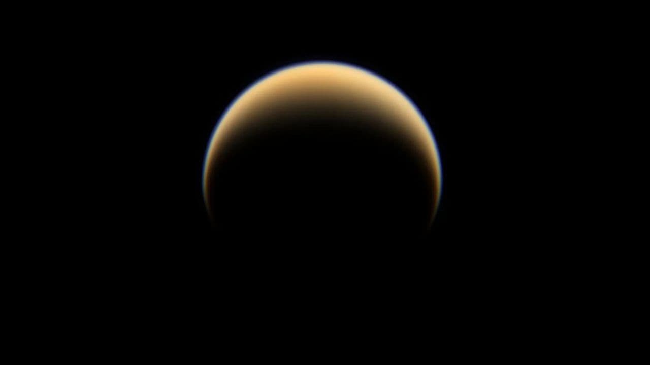 Scientists discover mystery molecule on Pluto and Saturn's moon Titan: 'We cannot say what it is'
