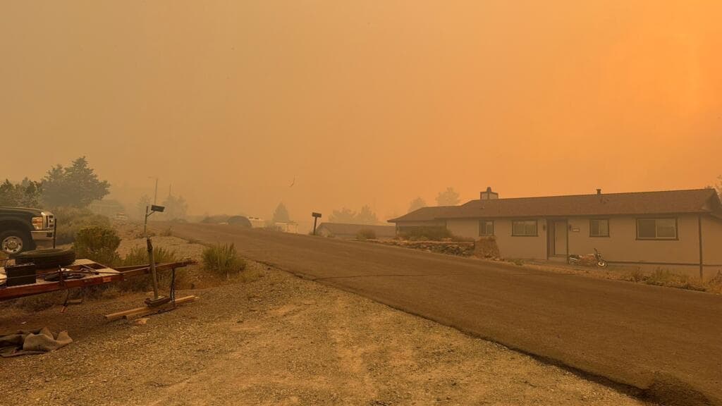 Nevada wildfire forces tens of thousands to evacuate as blaze threatens city of Reno