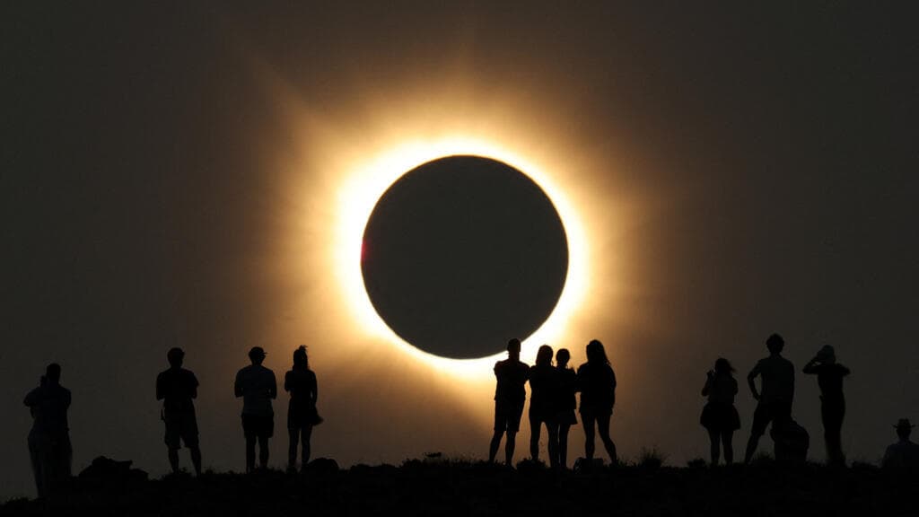 In pictures: Partial to total eclipse sweeps across much of Europe