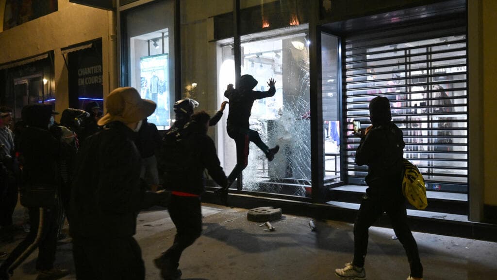 French shops demolished after weekend riots across the country
