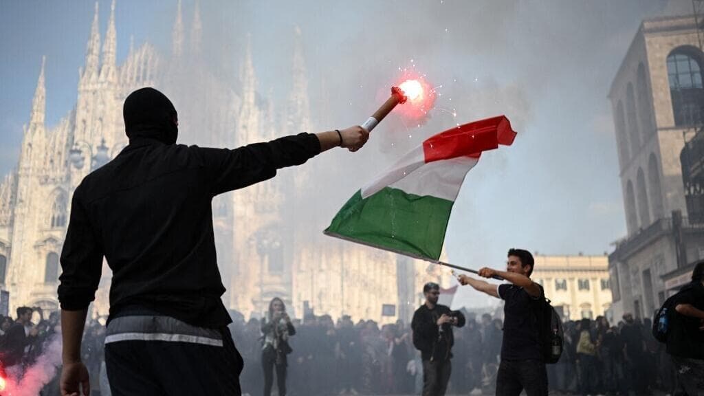 Italy sends troops, toughens security laws after Milan clashes