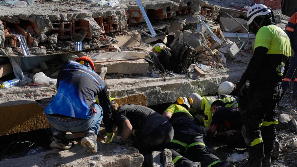Race to free trapped survivor offers hope in Colombia earthquake zone