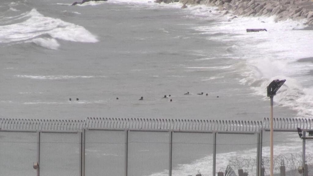 Hundreds of migrants enter Spain's north African territory Ceuta from Morocco