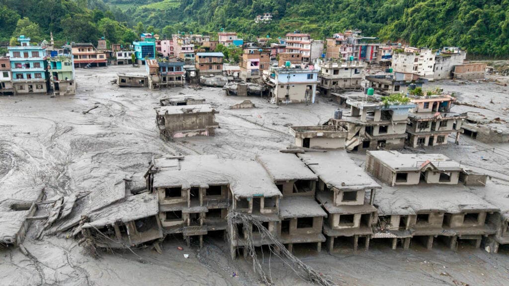 Week in pictures: devastating floods in Nepal, death of Dolly Parton and a tornado in France